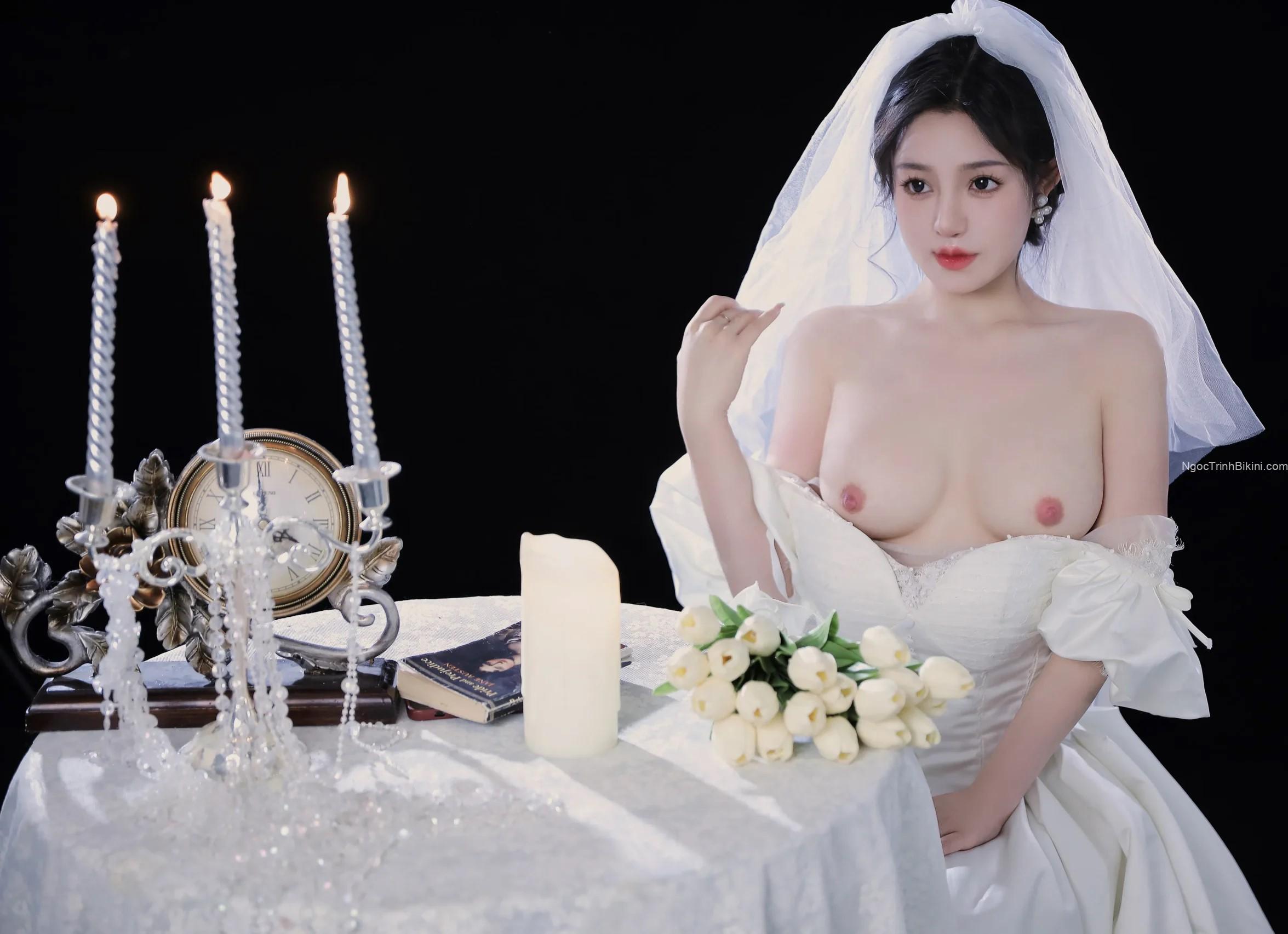 Ngắm cặp ngực tròn trịa của cô dâu dâm dục